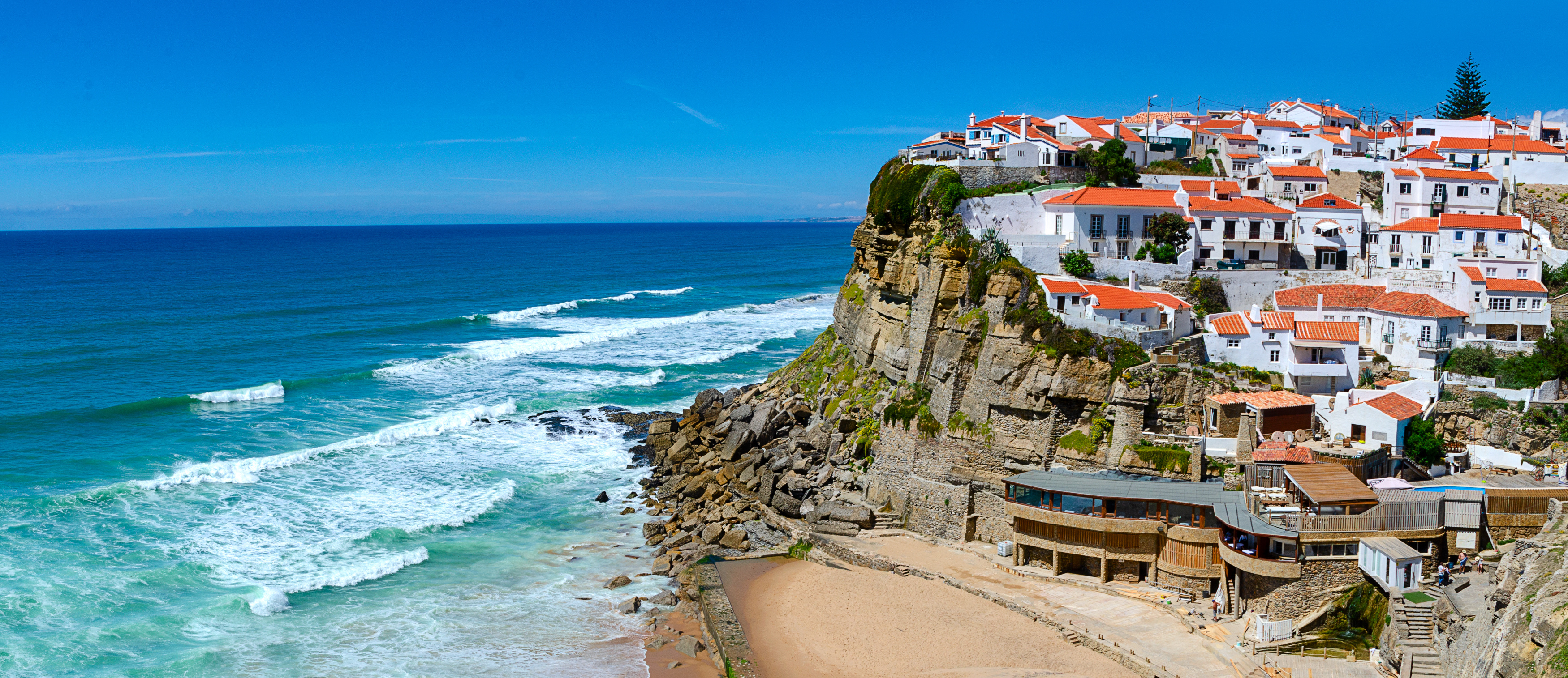 Panoramic view of Beautiful coastal view of Praia Azenhas do Ma Panoramic view of Beautiful coastal view of Praia Azenhas do Mar near Sintra, Lisbon. Praia Azenhas do Mar is one of the best beach in Portugal.
